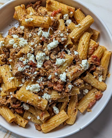 Tomato and Sausage Pasta with Creamy Goat Cheese - Unapologetic Eats