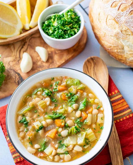 Creamy white bean soup with escarole and gremolata