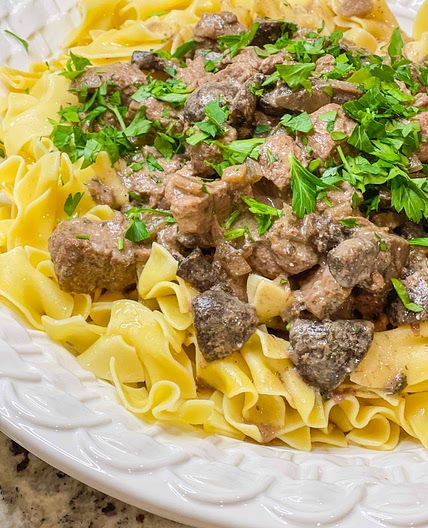 Crockpot beef stroganoff over egg noodles 