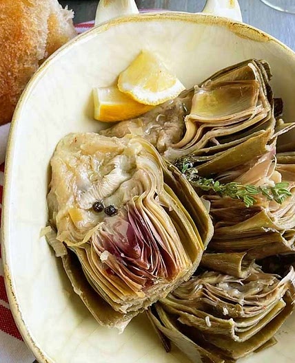 Slow cooked, lemon and garlic artichokes