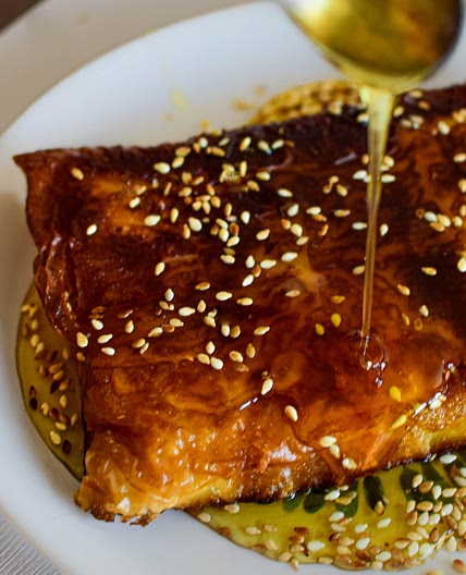 Feta Cheese Wrapped in Phyllo Pastry drizzled with honey and toasted sesame seeds