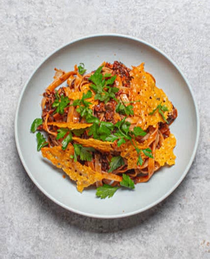 Mushroom Ragú pasta with Crispy Cheese