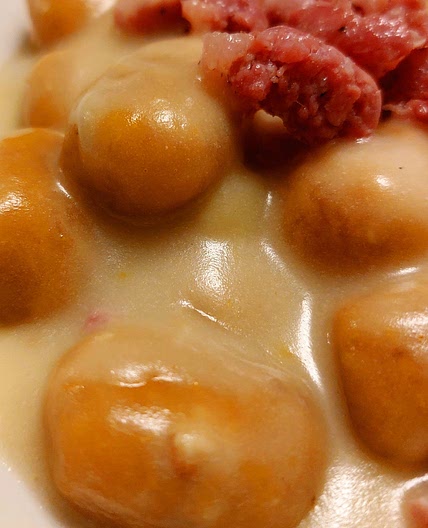 Pumpkin and ricotta gnocchi - potato cream and sausage