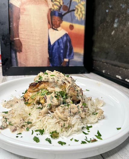 Spinach & Crab Stuffed Salmon with a jerk cream sauce
