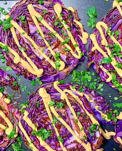 Roasted Red Cabbage Steaks With Red Pepper Tahini Sauce