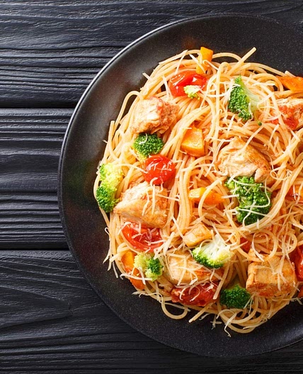 Lemon Chicken Spaghetti Squash with spinach and tomatoes 
