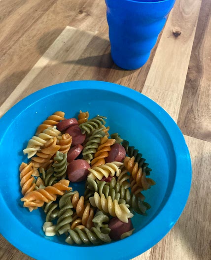 Kids veggie pasta and hotdog 