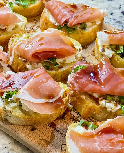 Prosciutto burrata crostini 