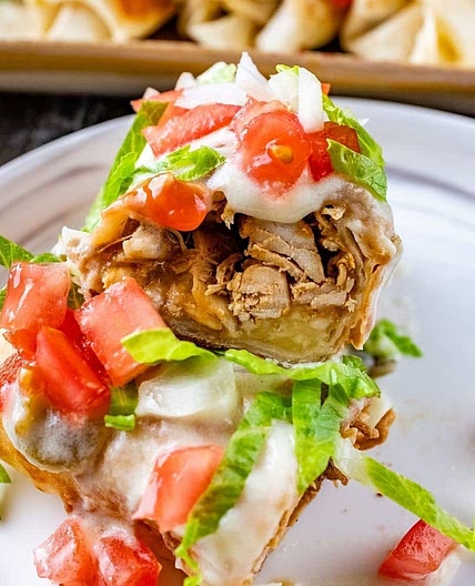 Chicken Chimichangas with Sour Cream Sauce