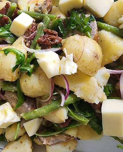Pork Sausage "Nicoise" with Mozzarella