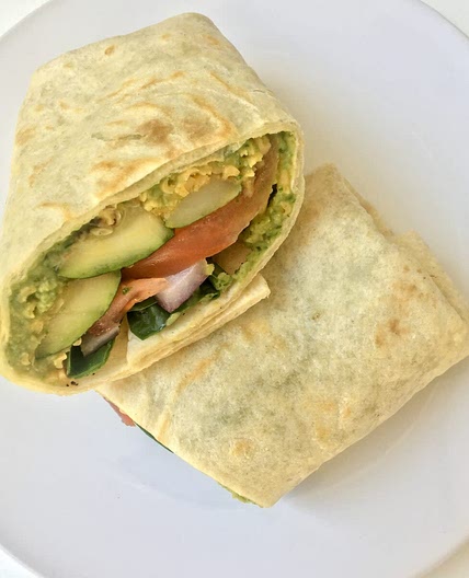 Shrimp tortilla with hummus and vegetables