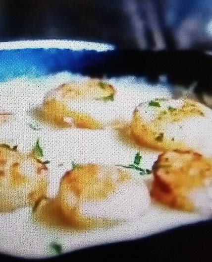 Scallops sous vide with butter cream sauce