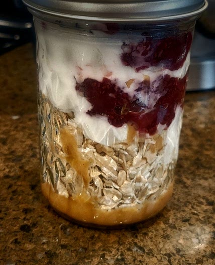 Peanut butter and Jelly Overnight Oat Parfait
Calories: 272
Protein: 14 g
Net Carbs: 24 g
Fat: 12.2