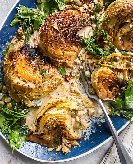Braised Cabbage with Anchovy Butter, Tahini and Herb & Caper Salad