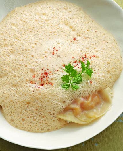 Ravioles de langoustines, crème de langoustines