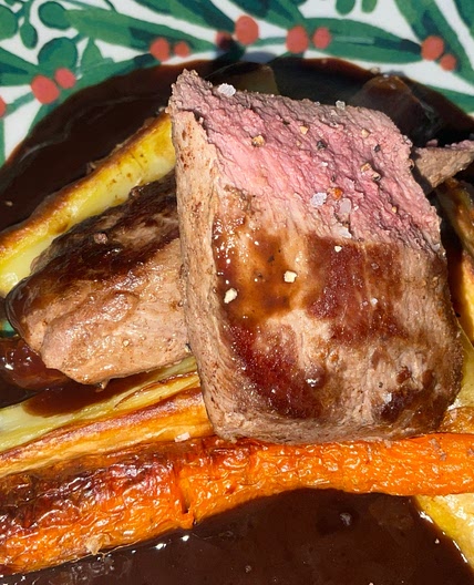 Venison Loin with a Red Wine and Juniper Sauce Served with Roasted Carrots and Parsnips