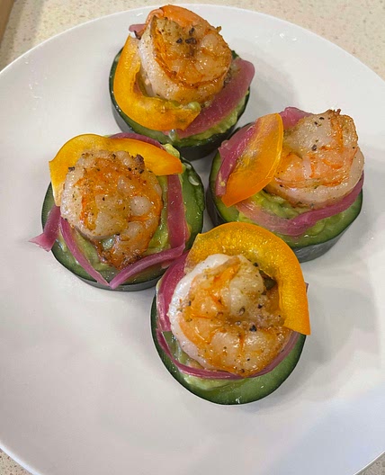Shrimp guacamole served on cucumber cup