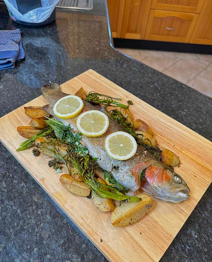 Baked rainbow trout w/roast potato’s and broccolini 
