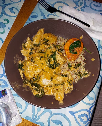 Cream Tomato Spinach Chicken on Quinoa