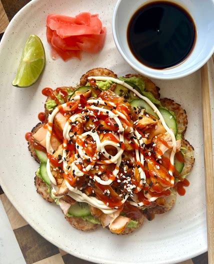 COOKED SALMON CRISPY RICE WAFFLE 🤤 with smashed avocado & cucumber.