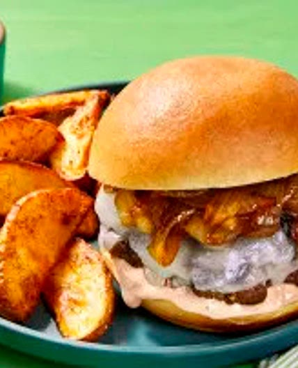 Cheesy Smashed Pork Burgers with Old Bay Fries, Caramelized Onion & Special Sauce