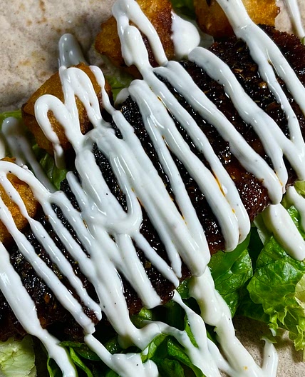 Brown Butter Hot Honey Glazed Chicken Burrito with Potato tots 