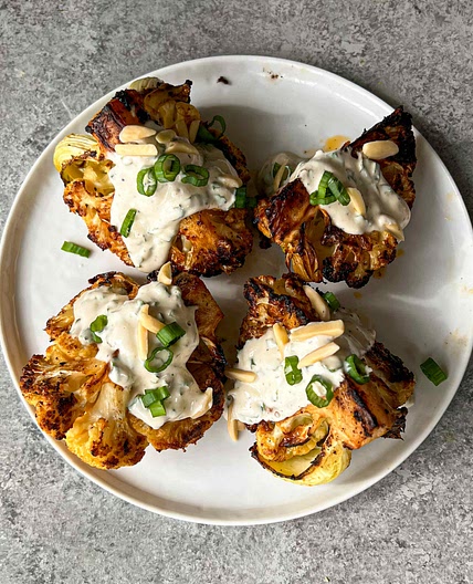 Charred Tomato-Balsamic Butter Cauliflower w/ Tahini-Basil