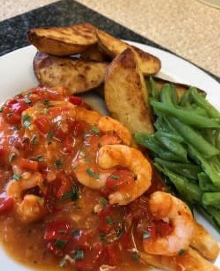 Basa Fillets & King Prawns in a spicy Cajun Tomato sauce