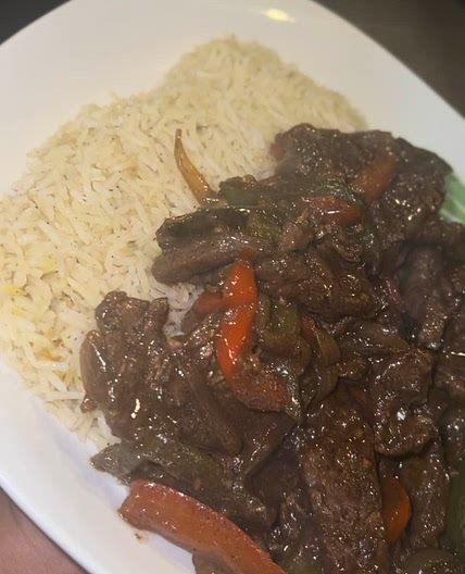 Sauteed Steak + Peppers w/ a side of rice