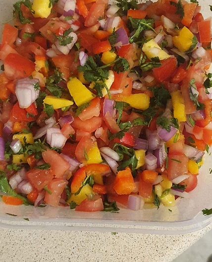 Fresh mango, pepper, coriander and onion salad
