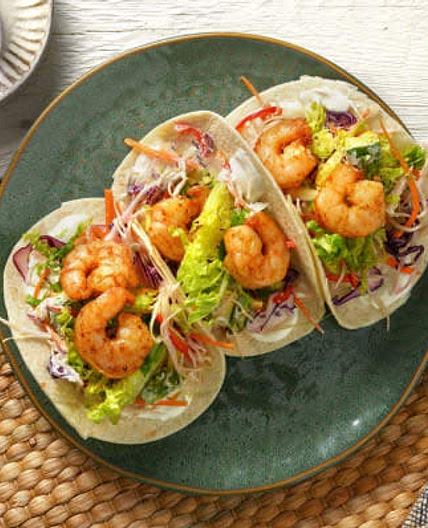 Smoky King Prawn Tacos
with Avocado Coleslaw and Lime Yoghurt