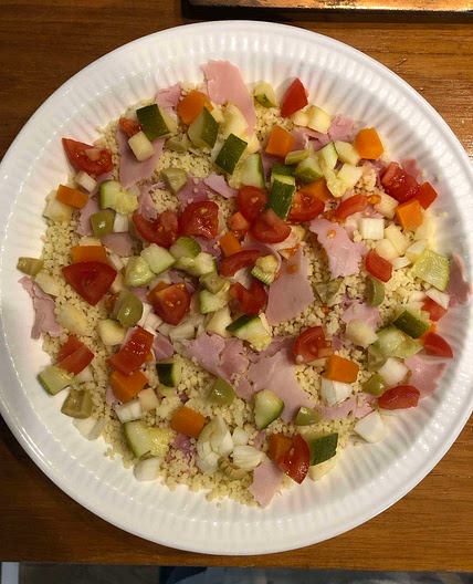 Veggie cous cous con prosciutto