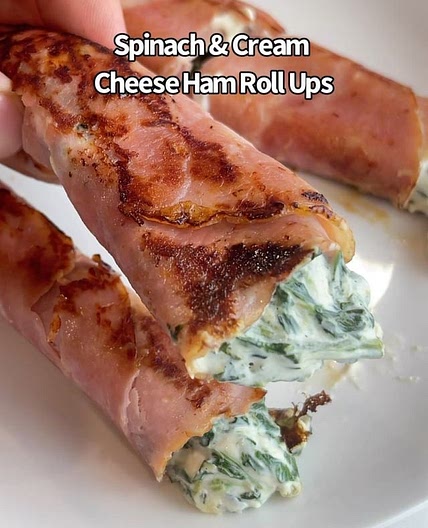 Say “YES” if you would eat these Cream Cheese &amp; Spinach Ham Roll Ups 😋🙌 Ingredients: Cooked spinach Cream cheese Ham Instructions: 1. Combine your spinach &amp; cream cheese. 2. Add to your ham and roll it up. 3. Pan fry on medium heat and turn until