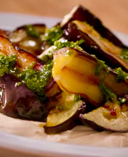 Roasted Eggplant with Hummus & Green Sauce. 