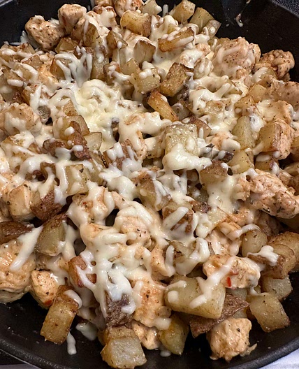 cheesy garlic parm and potato skillet