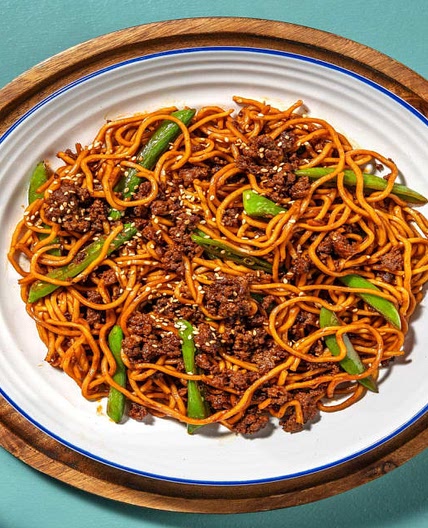 Thai Inspired Beef and Noodle Stir-Fry with Sugar Snaps and Sesame Seeds