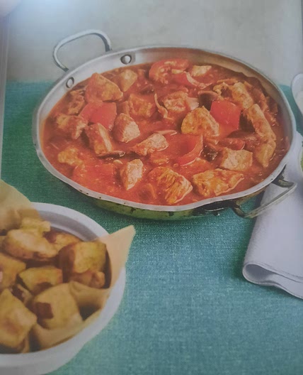 Chicken dopiaza with cumin roast potatoes