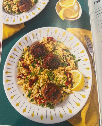 Lemony rice bowl with meatballs and sun-dried tomatoes