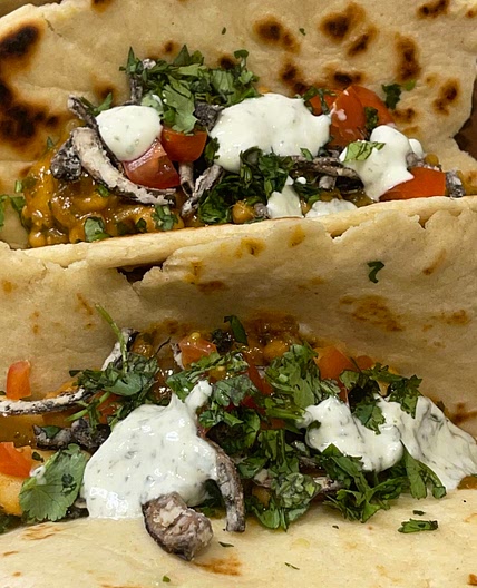 Bean bean curry Naan bread Tacos