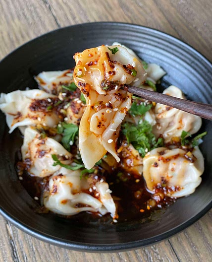 Shrimp and pork dumplings in a spicy chili sauce 