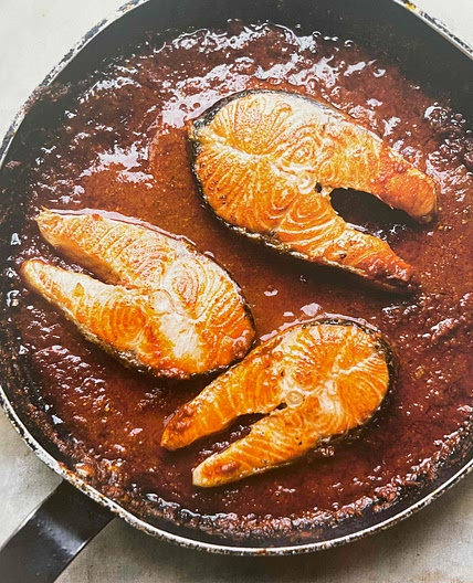 Salmon steaks in chraimeh sauce