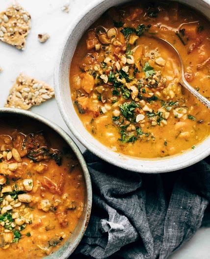 Spicy Peanut Soup with Sweet Potato + Kale