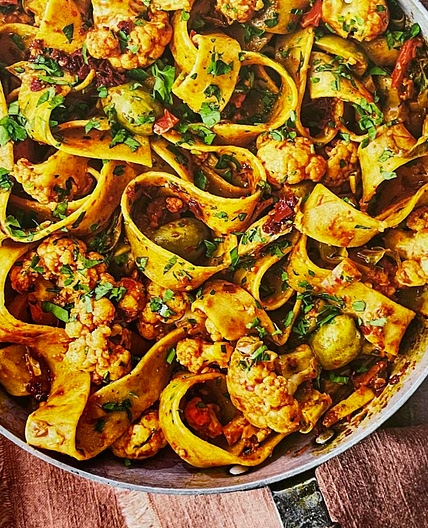 Olive, cauliflower, and harissa pasta 