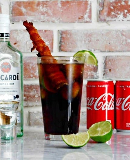 Rum and Coke Recipe with a Bacon Straw