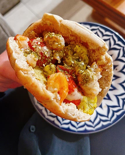 Shrimps & curry cauliflower pita with tahini & zaatar