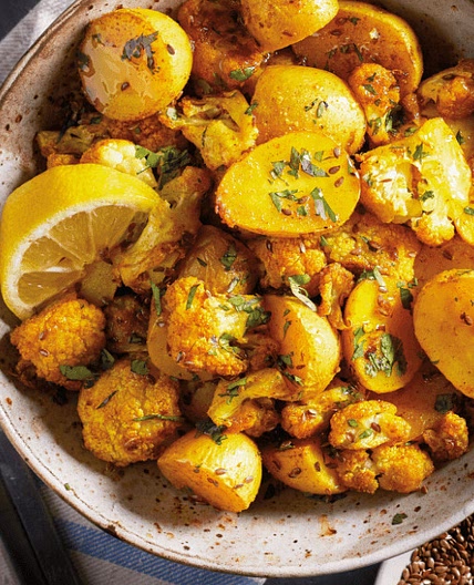 Roasted Curried Potatoes and Cauliflower with Flax Oil and Seeds
