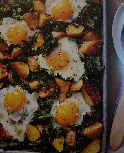 Roasted potato and kale hash with eggs