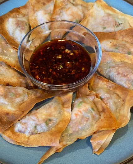 Crispy air fryer dumplings with chili oil sauce 