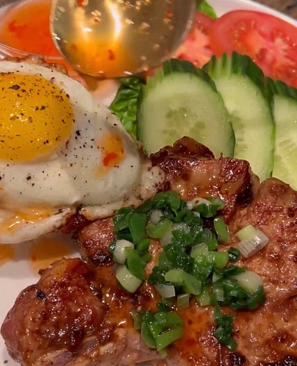 Lemongrass Pork Chops with a fried egg 