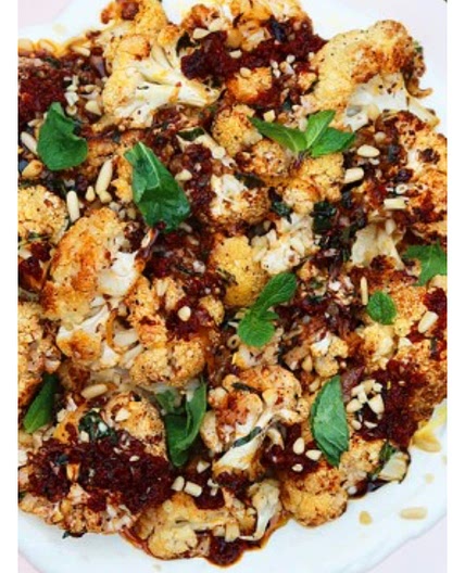 Roast cauliflower with yoghurt and spicy red pepper sauce